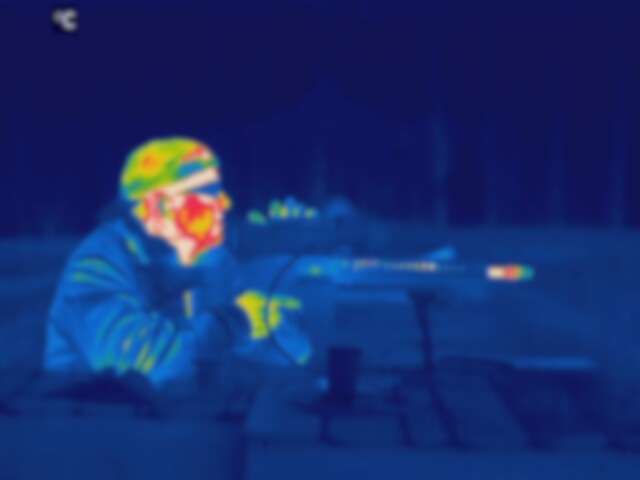 Thermal imaging of soldier with weapon