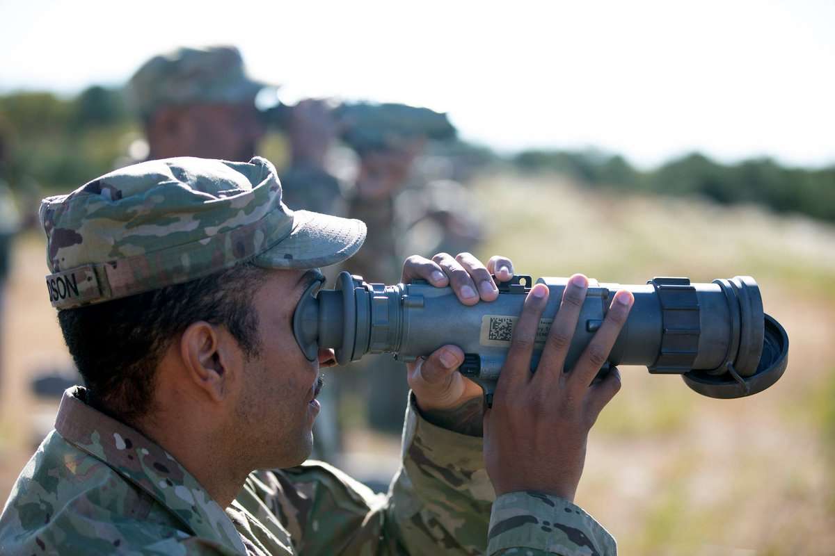 Military officer using thermal vision